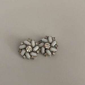 Milk glass and rhinestones set in a pretty round clip earring set. Vintage.